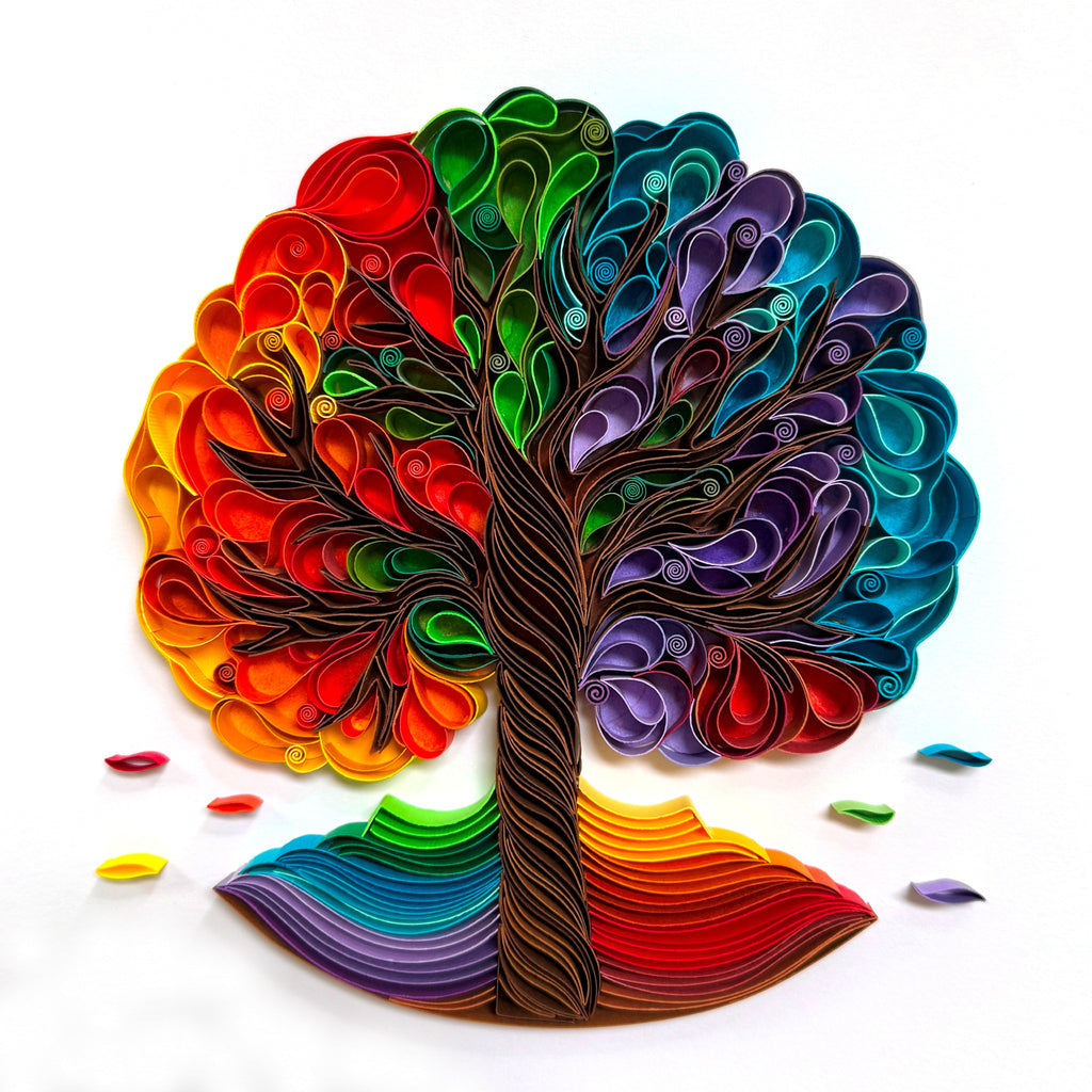 Colorful tree of life made from paper on a white background