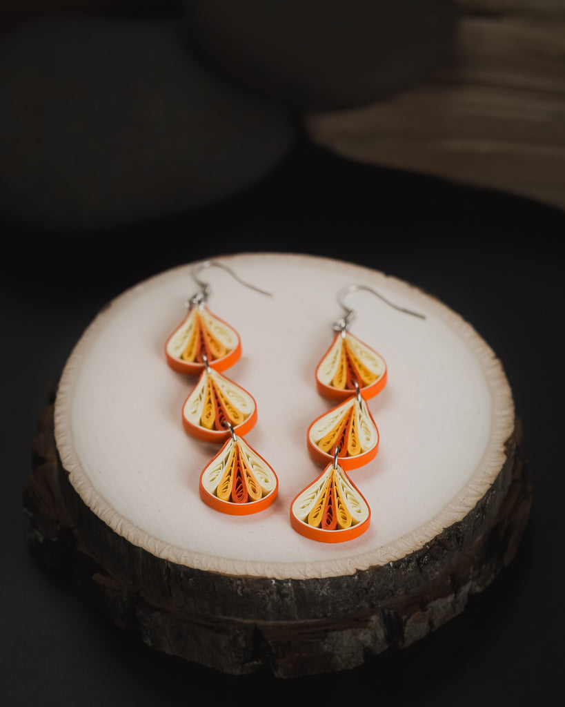 Trika Threefold Orange Long Earrings, handmade paper quilling light weight earrings made in California, USA. Sustainable fashion and eco-friendly earrings.
