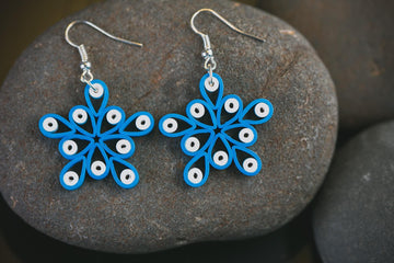 Nila Blue Star Celestial Earrings, handmade paper quilling light weight earrings made in California, USA. Sustainable fashion and eco-friendly earrings.